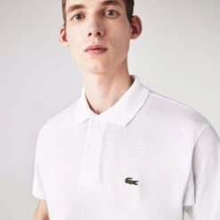 POLO A MANICA CORTA DA UOMO LACOSTE L1212 001 9 POLO A MANICA CORTA DA UOMO LACOSTE L1212 001 -Attiva Moda Negozio 0051469 polo a manica corta da uomo lacoste l1212 001