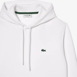 FELPA CON CAPPUCCIO DA UOMO LACOSTE SH9623 001 12 FELPA CON CAPPUCCIO DA UOMO LACOSTE SH9623 001 -Attiva Moda Negozio 0087803 lacoste sweatshirt 001